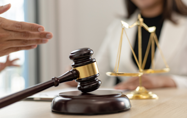 a gavel on a wooden block